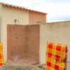 In the far northeast. Apartment with a large roof terrace. Font de Sa Cala.
