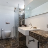 In the center of the Capitale. Spacious penthouse. Rooftop terrace with many options.