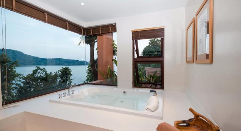 Phuket quality real estate presents this beautiful waterfront villa