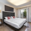 Large garden apartment. In luxurious facility. Contemporary equipment.