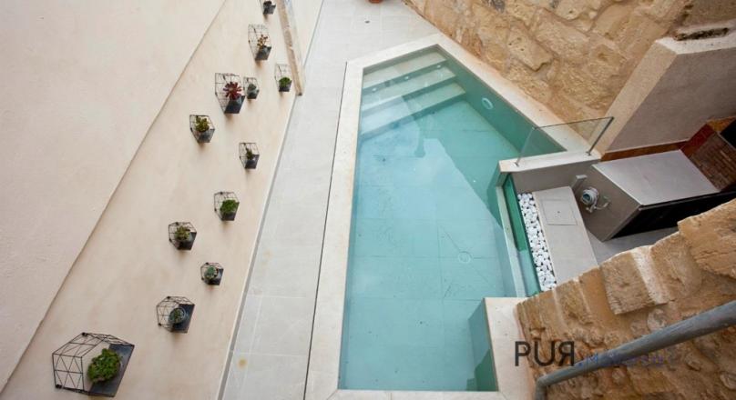 Pollenca. The most beautiful city in the north. Many say. A mansion there. In the middle. The finest