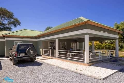 Three bedrooms stand alone house together with a coltage for sale