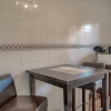 In the far northeast. Apartment with a large roof terrace. Font de Sa Cala.