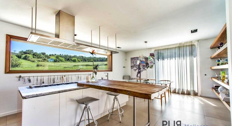 Sant Llorenc. Finca in a modern country style. Very stylish. With its own vineyard.