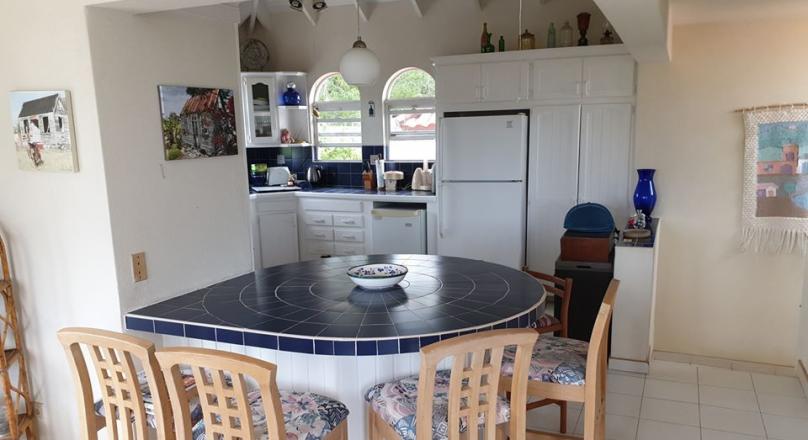 Breezy and spacious 3 Bed 2 Bath House with a roof deck located in St. George, Barbados is for sale.