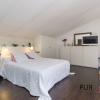 In the center of the Capitale. Spacious penthouse. Rooftop terrace with many options.