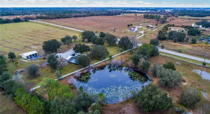 OPEN HOUSE, this 4 bed and 4 bath pool estate home