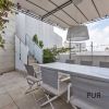 Above the roofs. Enjoy this city really. In a penthouse. In Santa Catalina.