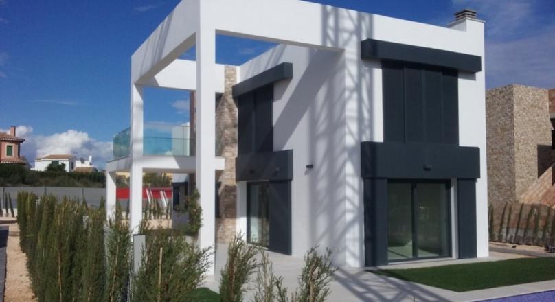 Villa. New building. Modern. White with Mallorcan stone.
