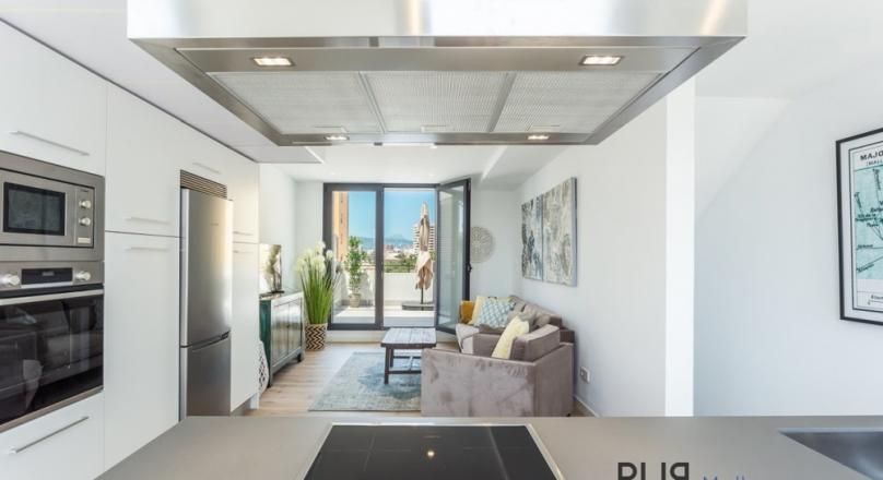 Sea view duplex apartment with roof terrace in El Molinar