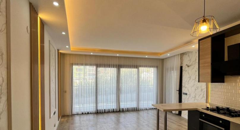 A brand new flat is for sale in the center of Kuşadası.