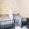 Qawra - Just a step away from the sea is this apartment with lovely sea views.