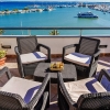 Small apartment with wow factor. View over the marina and seafront of Alcudia.
