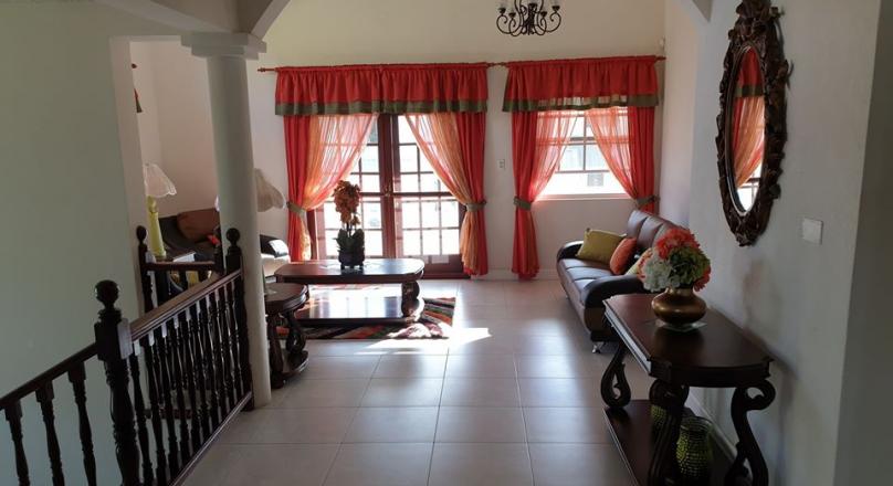 Beautiful Property with a 3 Bed 2 Bath main house and (3) tenanted 2 bedrooms apartments is for sale