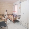 Qawra - Just a step away from the sea is this apartment with lovely sea views.