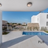New villas. Very chic. Very high quality. And on foot at the port and on the beach.