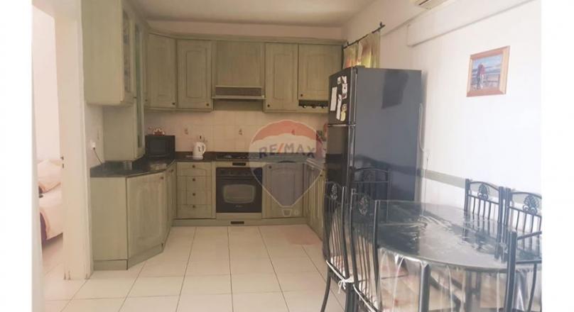 Qawra - Just a step away from the sea is this apartment with lovely sea views.