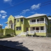 Beautiful Property with a 3 Bed 2 Bath main house and (3) tenanted 2 bedrooms apartments is for sale