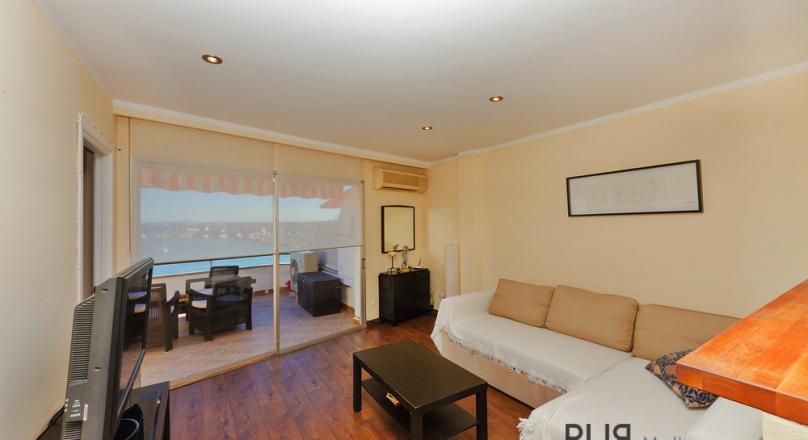 Small apartment with wow factor. View over the marina and seafront of Alcudia.