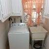 Beautiful Property with a 3 Bed 2 Bath main house and (3) tenanted 2 bedrooms apartments is for sale