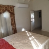 Beautiful Property with a 3 Bed 2 Bath main house and (3) tenanted 2 bedrooms apartments is for sale