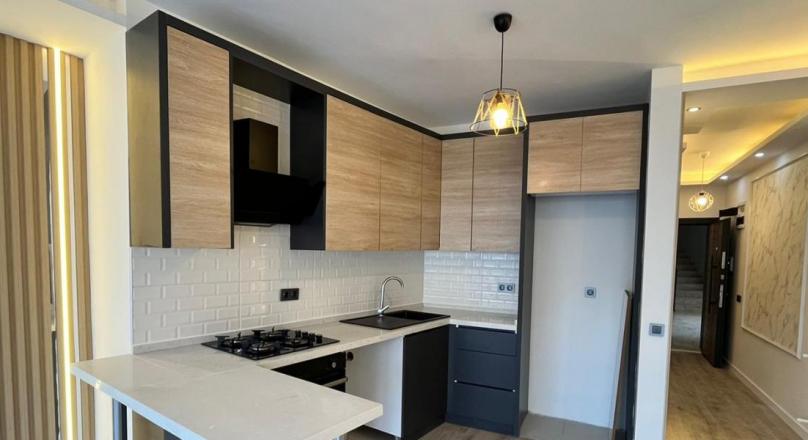 A brand new flat is for sale in the center of Kuşadası.