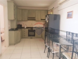 Qawra - Just a step away from the sea is this apartment with lovely sea views.