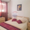 Qawra - Just a step away from the sea is this apartment with lovely sea views.